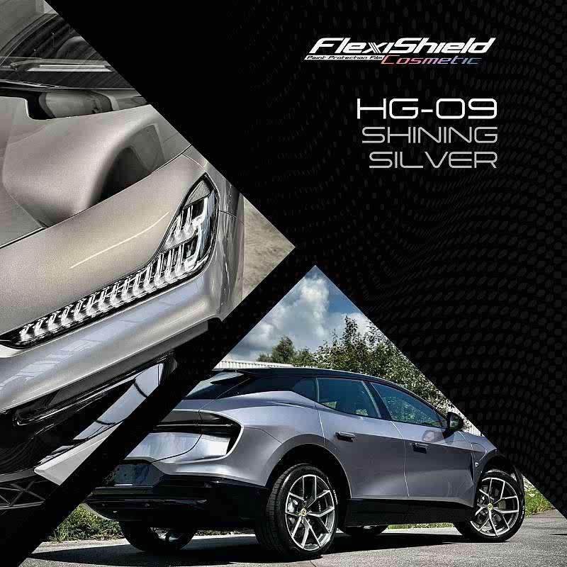 Image promotionnelle pour le FLEXISHIELD Cosmétique PPF TP-04 Moon Beam 2.0, avec un phare et un rétroviseur latéral élégants. La voiture argentée éclairée par la lune scintille avec Moon Beam 2.0 sur fond darbres sous un ciel partiellement nuageux. - Tekalab
